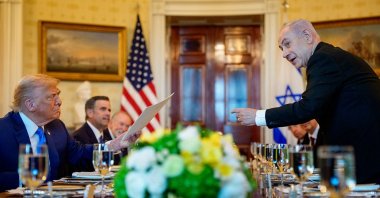 Israeli Prime Minister Benjamin Netanyahu (R) hands off a letter he sent to the Nobel Peace Prize committee to nominate U.S. President Donald Trump (L) for the Nobel Peace Prize, the White House, Washington, D.C., U.S., July 7, 2025. (Getty Images Photo)