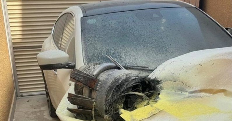 This handout picture provided by the Saudi Press Agency (SPA) shows the remains of a projectile on top of a damaged vehicle found by civil defence responders checking damage at an apartment building, Riyadh, Saudi Arabia, Oct. 14, 2026. (AFP Photo)