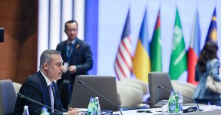 Foreign Minister Hakan Fidan delivers a speech at the seventh summit of the Conference on Interaction and Confidence Building Measures in Asia (CICA) in Baku, Azerbaijan, Oct. 15, 2026. (AA Photo)