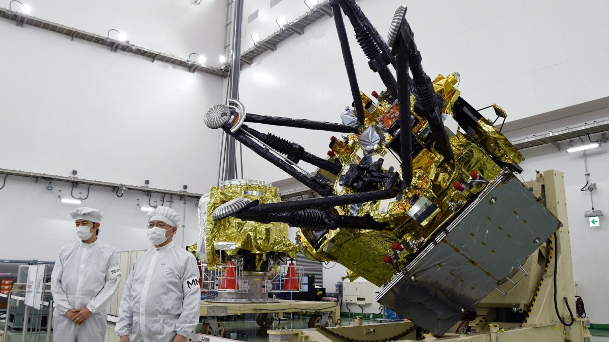 The Japan Aerospace Exploration Agency unveils a spacecraft for its Martian moons exploration mission at the Tanegashima Space Center, Minamitane, Japan, Aug. 13, 2026. (AP Photo)