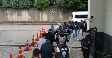 Police officers detain suspects during an operation, Kocaeli, Türkiye, Oct. 15, 2026. (AA Photo)