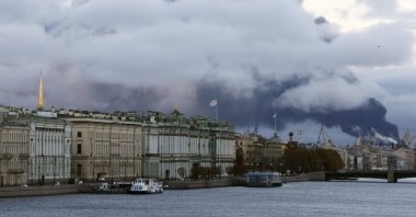 A view of the Palace Embankment as smoke rises from a fire at the St. Petersburg Oil Terminal in St. Petersburg, Russia, Oct. 18, 2026. (EPA Photo)