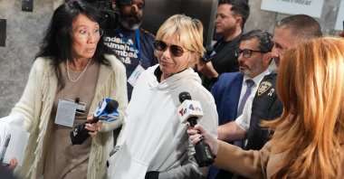 Selma Blair leaves court after her arraignment on charges of injuring two flight attendants during a cross-country flight, New York, U.S., Oct. 12, 2026. (AP Photo)