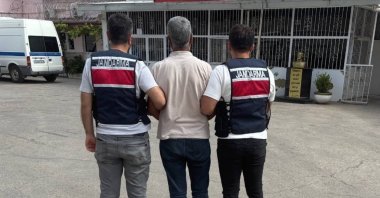 Security officers escort a captured FETÖ member, Gaziantep, southern Türkiye, Oct. 6, 2026. (İHA Photo)