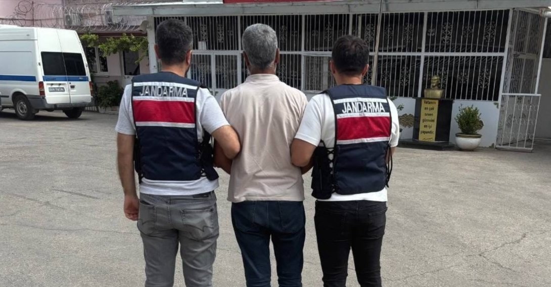Security officers escort a captured FETÖ member, Gaziantep, southern Türkiye, Oct. 6, 2026. (İHA Photo)