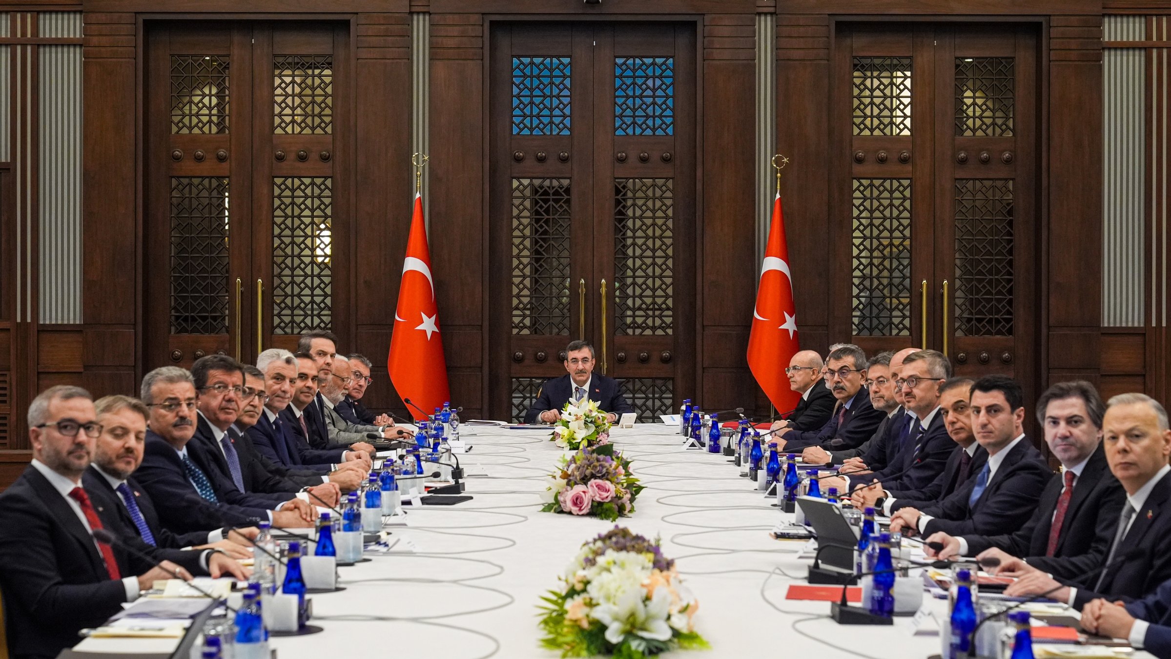 Vice President Cevdet Yılmaz (C) and other officials pose for a photo before the Economic Coordination Board meeting, Ankara, Türkiye, Oct. 19, 2026. (AA Photo)