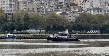 Police and rescue teams search by boat for people reported missing after severe rainfall, Istanbul, Türkiye, Oct. 18, 2026. (AA Photo)