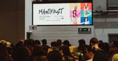 Fans wait to enter OVO Arena Wembley as images of Turkish pop group Manifest appear on a screen ahead of the group’s sold-out concert in London, England, U.K., Oct. 16, 2026. (Photo courtesy of Hakan Uç)