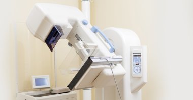 A mammography machine is used to screen for breast cancer at a radiology center. (Shutterstcok Photo)