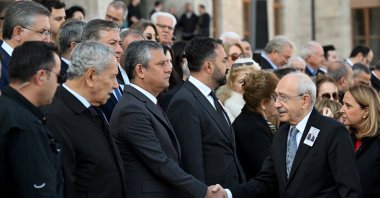 YP Chair Özgür Özel (L) shakes hands with CHP leader Kemal Kılıçdaroğlu during a funeral ceremony, Ankara, Türkiye, Oct. 19, 2026. (AA Photo)