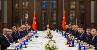 Vice President Cevdet Yılmaz (C) and other officials pose for a photo before the Economic Coordination Board meeting, Ankara, Türkiye, Oct. 19, 2026. (AA Photo)