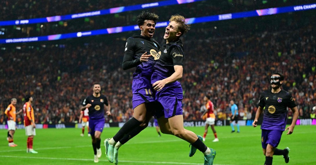 Barcelona's Spanish midfielder Fermin Lopez (R) celebrates with Lamine Yamal (L) after scoring a goal in UEFA Champions League match against Galatasaray, in Istanbul, Oct. 13, 2026. (AFP Photo)