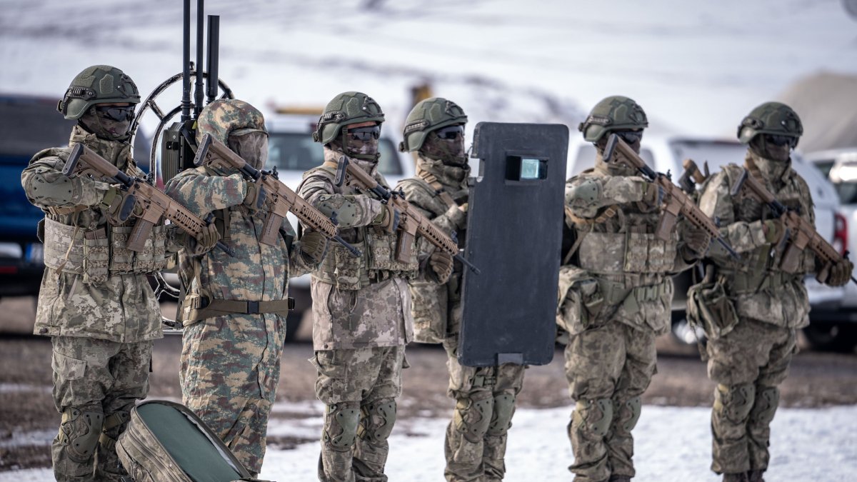 Turkish troops participate in a military exercise, in Kars, eastern Türkiye, Feb. 5, 2025. (AA Photo) 