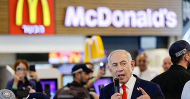 Israeli Prime Minister Benjamin Netanyahu speaks near a McDonald's as he meets members of the public at a mall, Ramla, Israel, Oct. 19, 2026. (Reuters Photo)