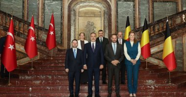 Foreign Minister Hakan Fidan, Interior Minister Mustafa Çiftçi and Justice Minister Akın Gürlek pose for a group photo with Belgian and Turkish officials, Brussels, Belgium, Oct. 20, 2026. (AA Photo)