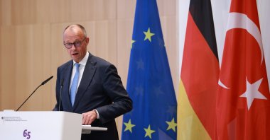 German Chancellor Friedrich Merz delivers a speech during a ceremony marking the 65th anniversary of the German-Turkish recruitment agreement in Berlin, Germany, Oct. 20, 2026.  (EPA Photo)