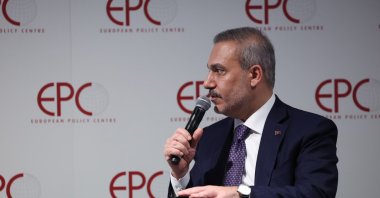 Foreign Minister Hakan Fidan addresses participants at the European Policy Centre, Brussels, Oct. 20, 2026. (AA Photo)