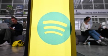 A Spotify logo is seen at the 78th Frankfurt book fair, the world's biggest trade fair for books, in Frankfurt am Main, western Germany, Oct. 8, 2026. (AFP Photo) 