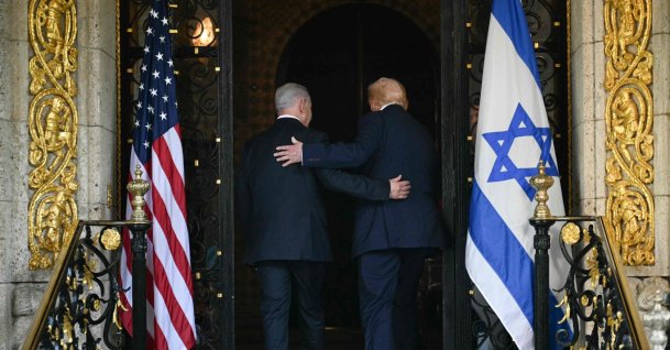 U.S. President Donald Trump and Israeli Prime Minister Benjamin Netanyahu walk inside after Netanyahu arrived at Trump’s Mar-a-Lago residence in Palm Beach, Florida, Dec. 29, 2025. (AFP Photo)