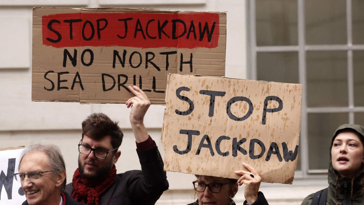 Demonstrators hold anti-Jackdaw placards as they demonstrate against further drilling for oil and gas in the North Sea, outside the Department for Energy Security and Net Zero in central London, U.K., Oct. 21, 2026. (AFP Photo)
