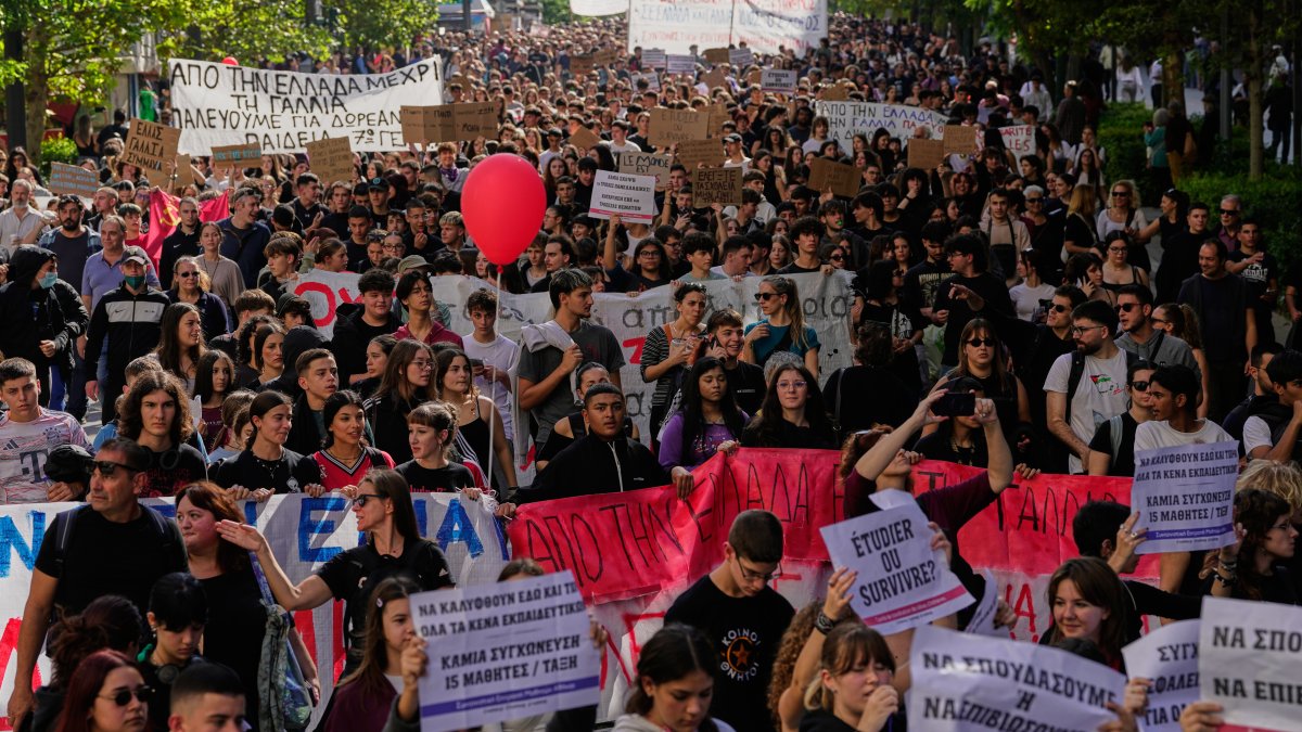 Protesters take part in a rally organized by teachers and students demanding improvements to education and measures to address the rising cost of living in Athens, Greece, Wednesday, Oct. 21, 2026. (AP Photo)