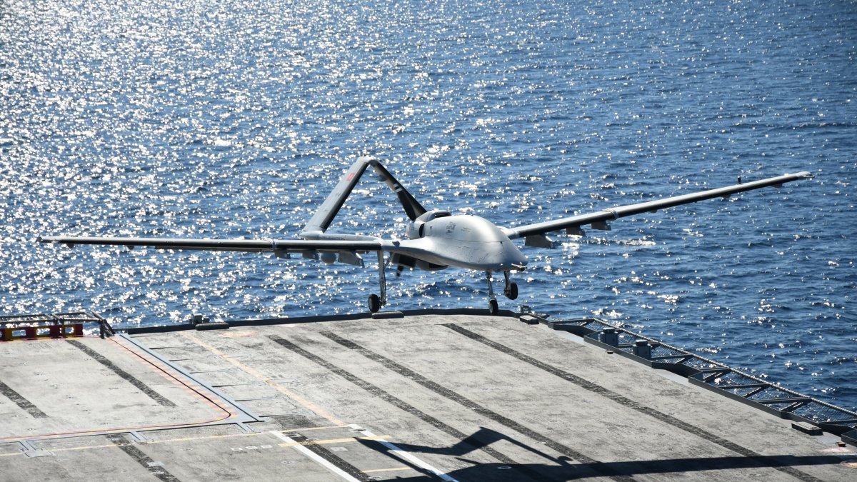 The Bayraktar TB3 combat drone lands on the Turkish amphibious assault ship TCG Anadolu during a NATO drill off a port in Vlore, Albania, Oct. 19, 2026. (AA Photo)