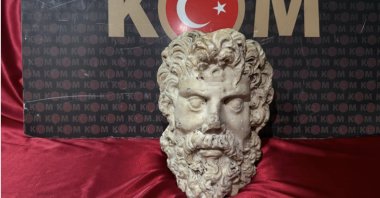 The marble head of Zeus, believed to date back about 2,000 years to the Roman period, seized in Izmir, Türkiye, Oct. 21, 2026. (AA Photo)