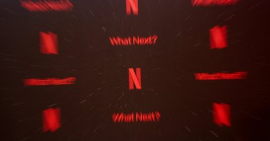 Netflix logo is displayed on a hoarding during an event, Mumbai, India, Feb. 3, 2026. (Reuters Photo)