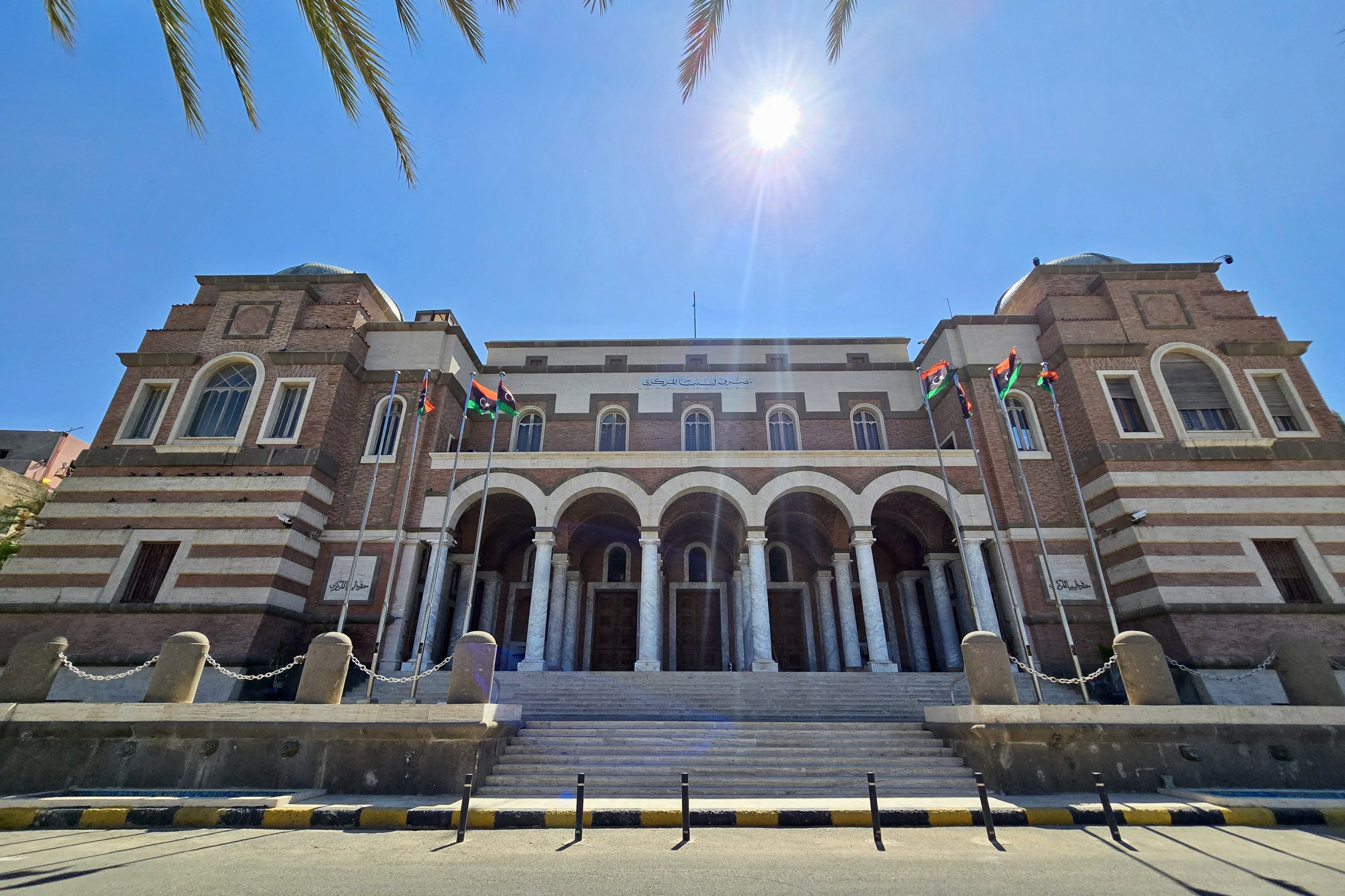 Libya central bank headquarters raided after governor resigns