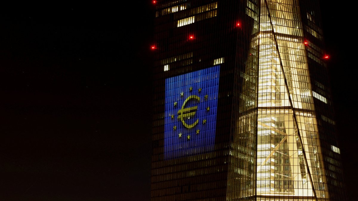 The facade of the European Central Bank (ECB) headquarters is illuminated during a rehearsal of a ceremony to celebrate Bulgaria's accession to the eurozone, Frankfurt, Germany, Dec. 30, 2025. (Reuters Photo)
