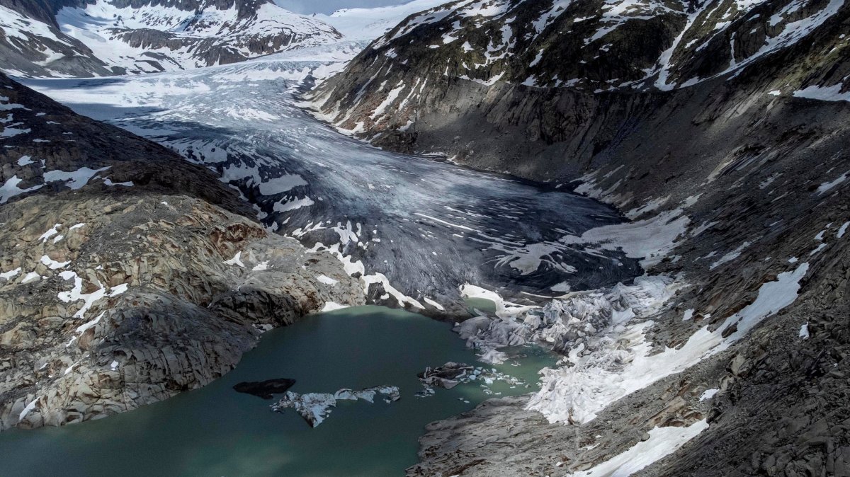A lake of meltwater has formed on the tongue of the Rhone glacier, near Goms, Switzerland, June 13, 2023. (AP Photo)