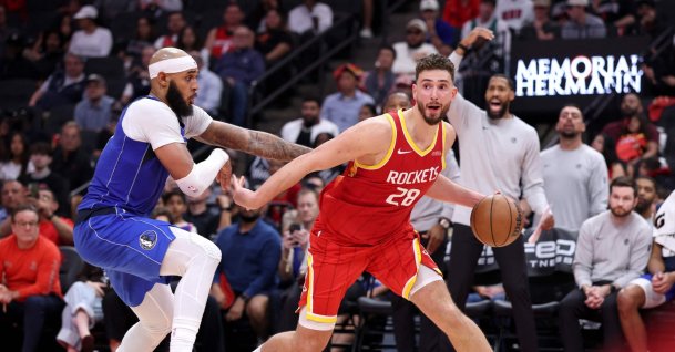 Houston Rockets' Alperen Şengün drives to the basket during the fourth quarter of the game against Dallas Mavericks' Daniel Gafford at Toyota Center, Houston, U.S., Oct. 21, 2026. (AFP Photo)