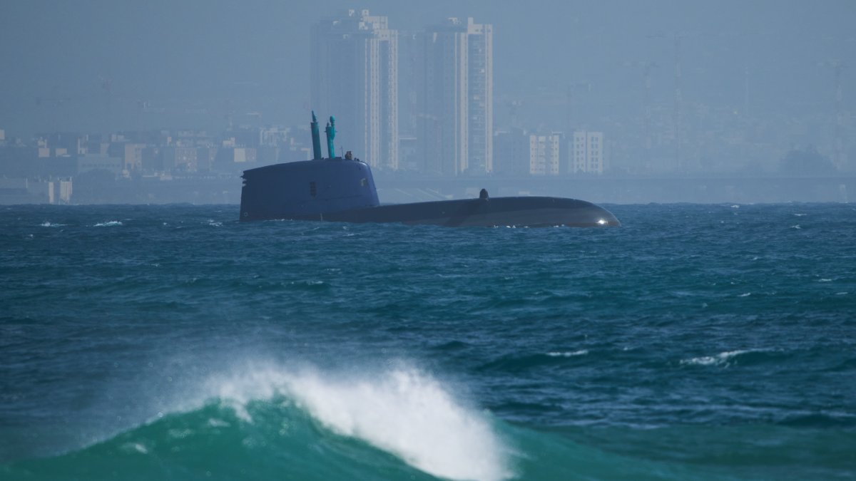 An Israeli naval submarine sails off the coast, Haifa, Israel, Feb. 18, 2026. (AP Photo)