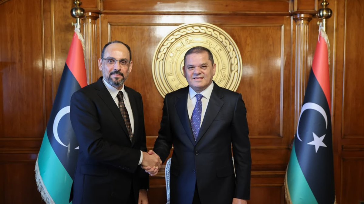 Ibrahim Kalın, head of the National Intelligence Organization (MIT), and Libyan Prime Minister Abdul Hamid Mohammed Dbeibah pose for a photo during a meeting, Tripoli, Libya, Oct. 20, 2026. (AA Photo)