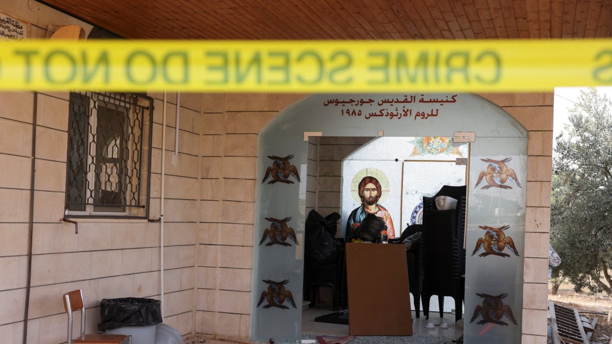 The grounds of Saint George’s Greek Orthodox Church, where gunmen opened fire during a funeral the previous day, is cordoned-off, in the village of Hamoud, Karak, Jordan, Oct. 24, 2026. (Reuters Photo)