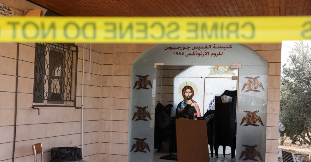 The grounds of Saint George’s Greek Orthodox Church, where gunmen opened fire during a funeral the previous day, is cordoned-off, in the village of Hamoud, Karak, Jordan, Oct. 24, 2026. (Reuters Photo)