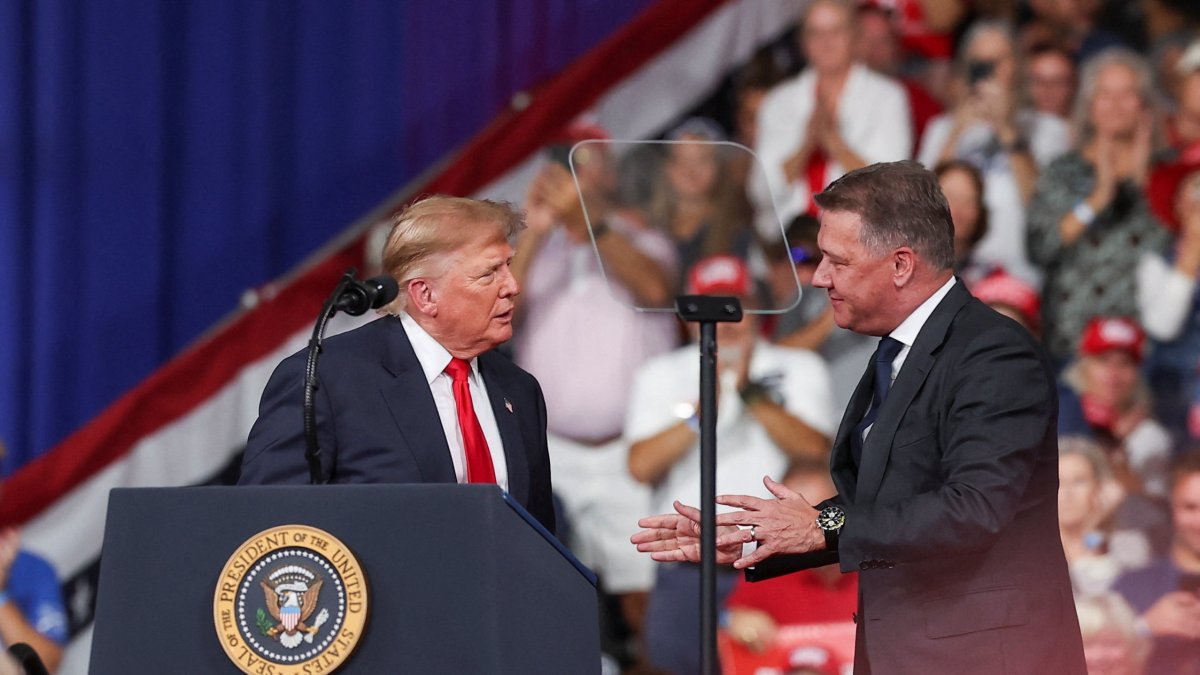 U.S. President Donald Trump and Gernot Dollner, CEO of Audi AG, attend a rally at Guardian Centers in Perry, Georgia, U.S., Oct. 24, 2026. (Reuters Photo)
