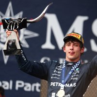 Race winner Mercedes AMG's Andrea Kimi Antonelli lifts his trophy on the podium during the F1 U.S. GP in Austin, Texas, U.S., Oct. 25, 2026. (AFP Photo) 
