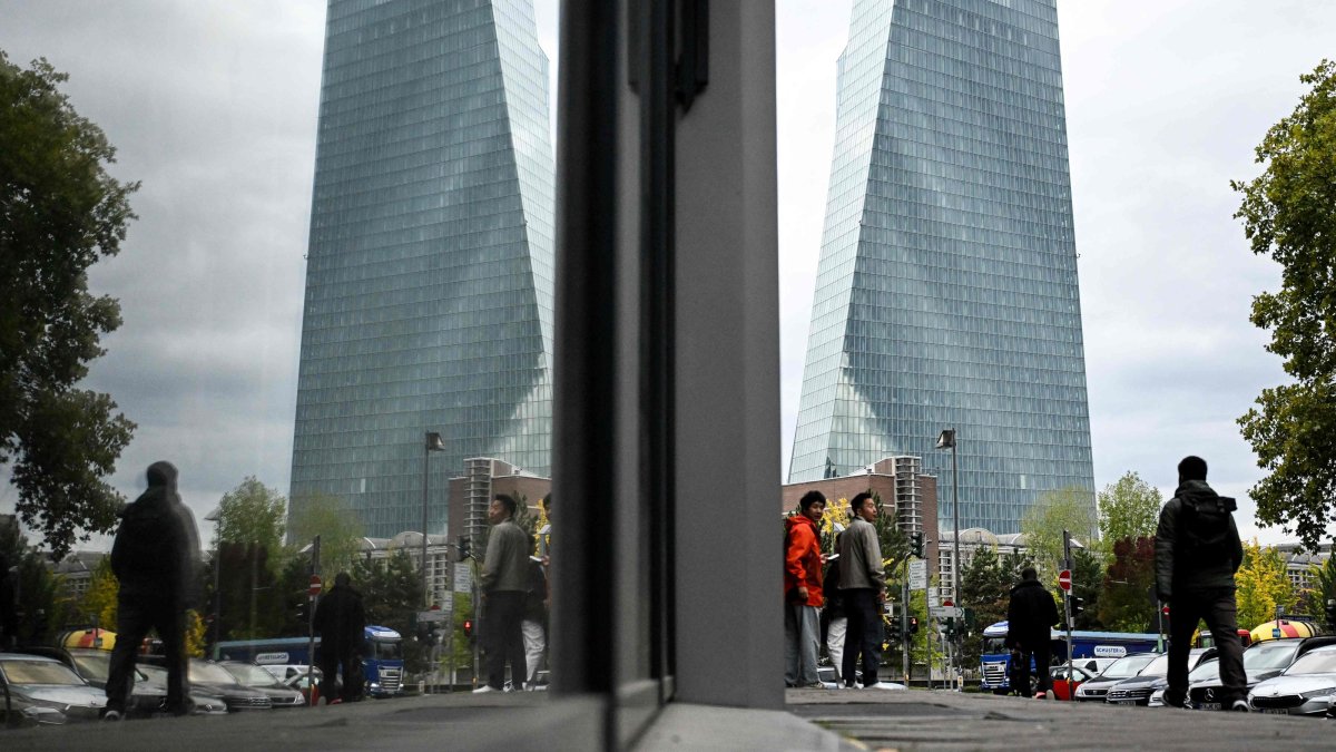 The European Central Bank (ECB) headquarters is reflected in a window, Frankfurt am Main, Germany, Oct. 23, 2026. (AFP Photo)