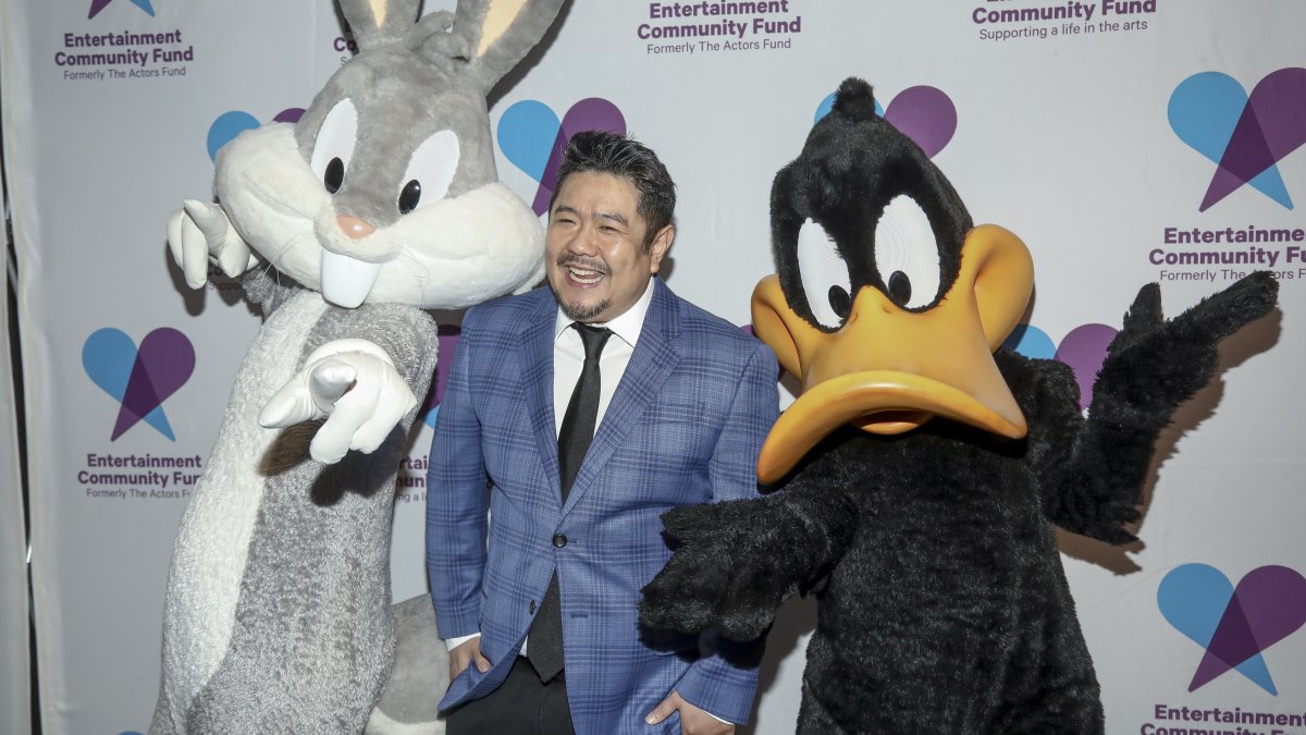 From L-R, Bugs Bunny, voice actor Eric Bauza and Daffy Duck attends the Entertainment Community Fund gala benefit at the Marriott Marquis, New York, U.S., April 8, 2024. (AP Photo)