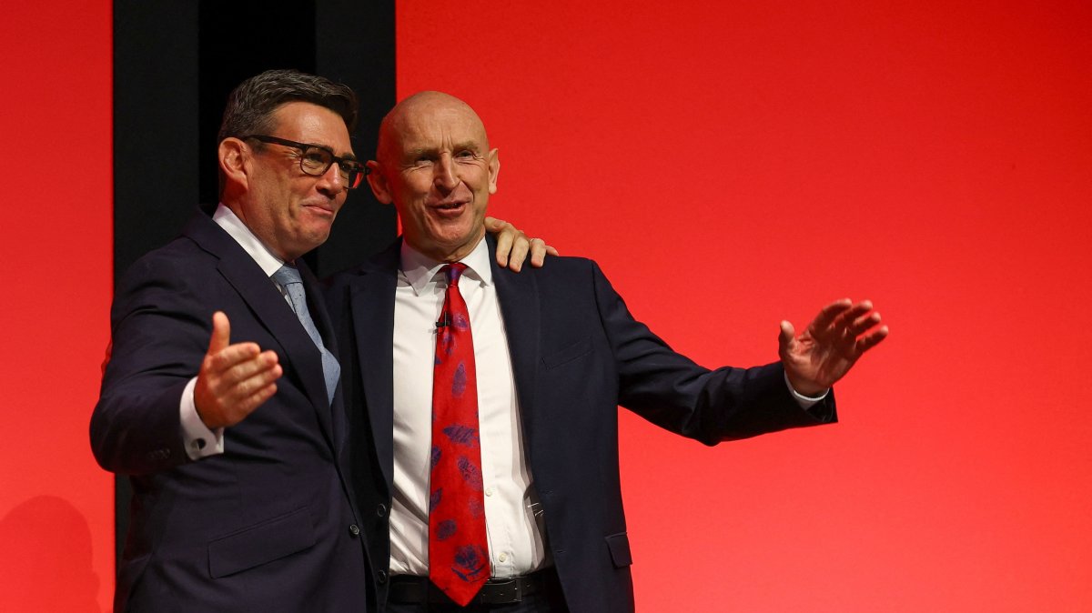 British Prime Minister Andy Burnham (L) and Treasury chief John Healey react during the Labour Party's annual conference, Liverpool, Britain, Sept. 28, 2026. (Reuters Photo)