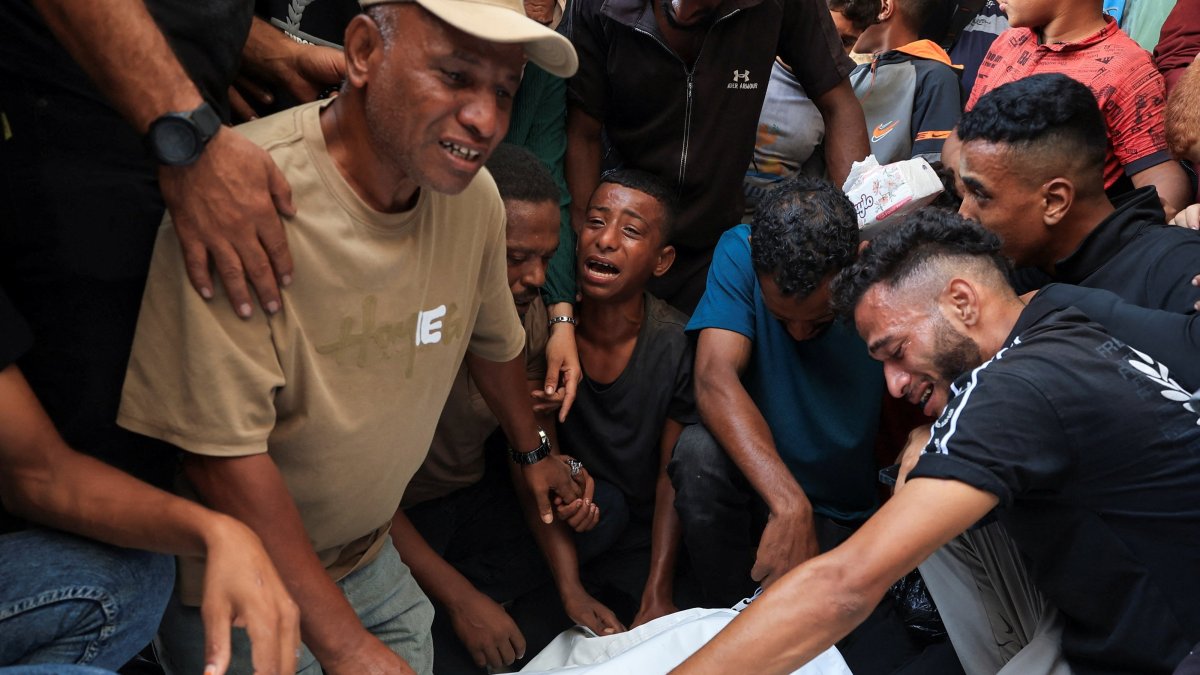 Mourners react during the funeral of three Palestinians who were killed in an Israeli strike in Gaza City, Palestine, Oct. 25, 2026. (Reuters Photo)