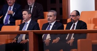 Intelligence chief Ibrahim Kalın (R) sits next to Foreign Minister Hakan Fidan (C) and Minister of Energy and Natural Resources Alparslan Bayraktar during a session at Parliament, Ankara, Türkiye, Oct. 1, 2026. (AA Photo)