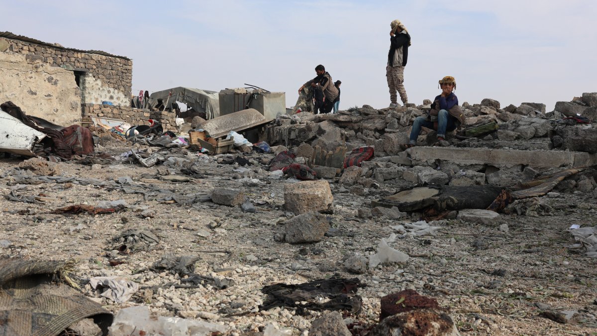 People inspect a site damaged by a Jordanian airstrike in the Daraa countryside, southern Syria, Oct. 27, 2026. (EPA Photo)
