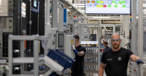 A worker assembles axial-flux motors for electric vehicles on an assembly line at the Mercedes-Benz engine factory, Berlin, Germany, June 9, 2026. (Reuters Photo)