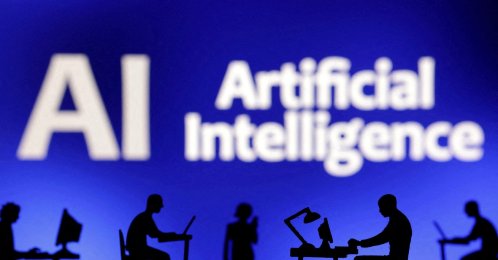  Figurines with computers and smartphones are seen in front of the words "Artificial Intelligence AI" in this illustration, Feb. 19, 2024. (Reuters File Photo)
