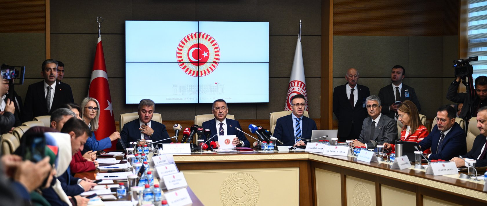 Foreign Affairs Committee Chair Fuat Oktay (C) speaks at the session on the Mecca defense alliance, Ankara, Türkiye, Oct. 27, 2026. (AA Photo)