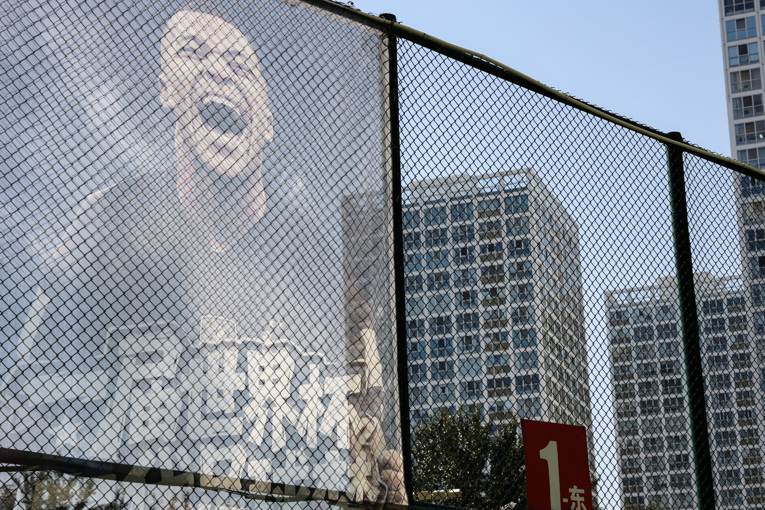 An image of French footballer Kylian Mbappe is displayed at a soccer field, Beijing, China, Oct. 28, 2026. (EPA Photo)