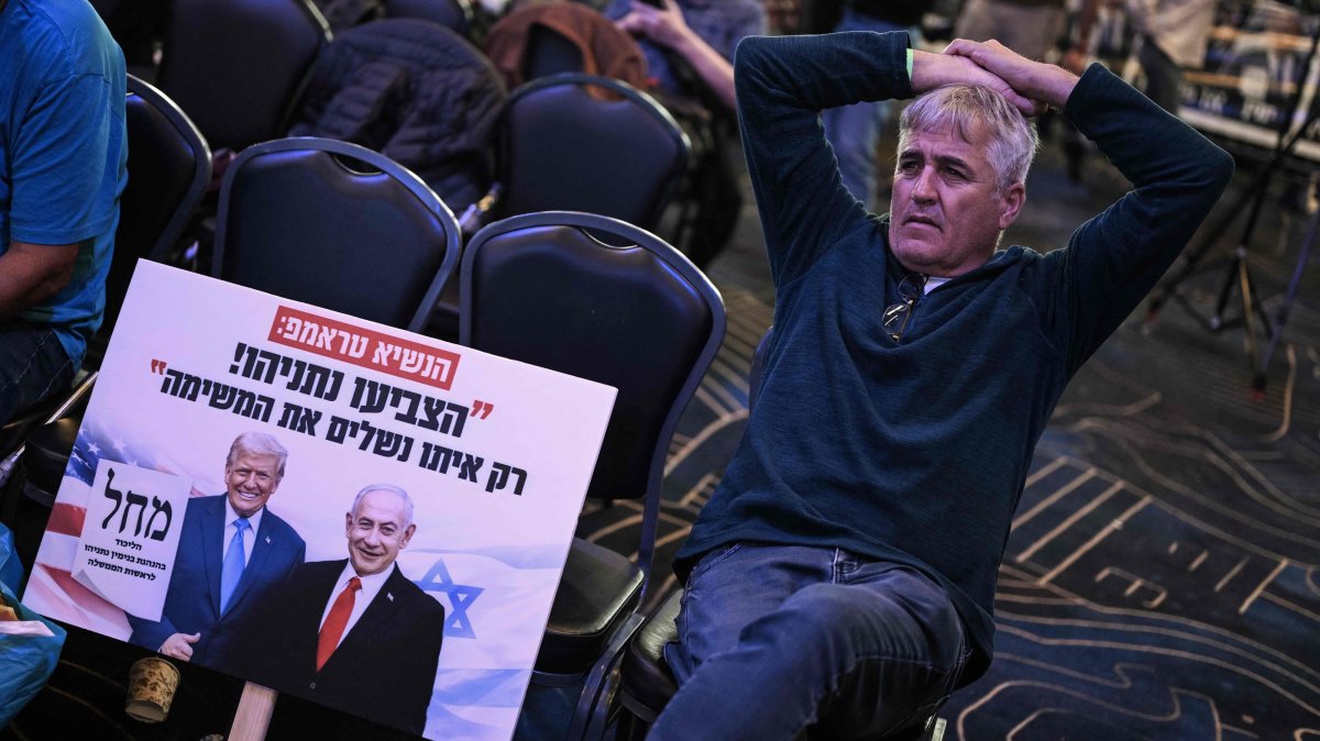 A supporter of the Likud party leader and Prime Minister Benjamin Netanyahu waits at the election night rally in Jerusalem, Oct. 28, 2026. (AFP Photo)
