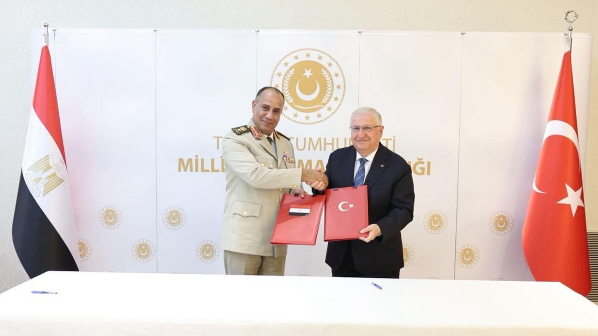 National Defense Minister Yaşar Güler (R) shakes hands with his Egyptian counterpart Ashraf Salem Zaher after signing the memorandum, Ankara, Türkiye, July 13, 2026. (DHA Photo)